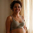 Smiling pregnant woman, Anya S.